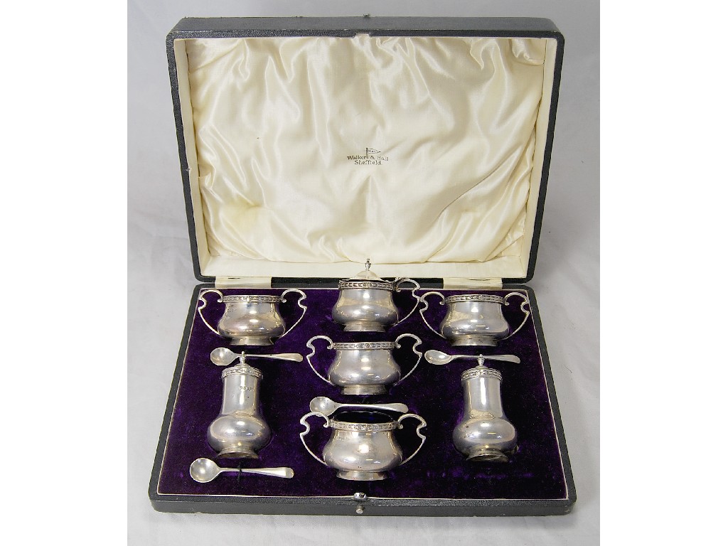 Appraisal: Victorian seven piece silver condiment set by Walker Hall in