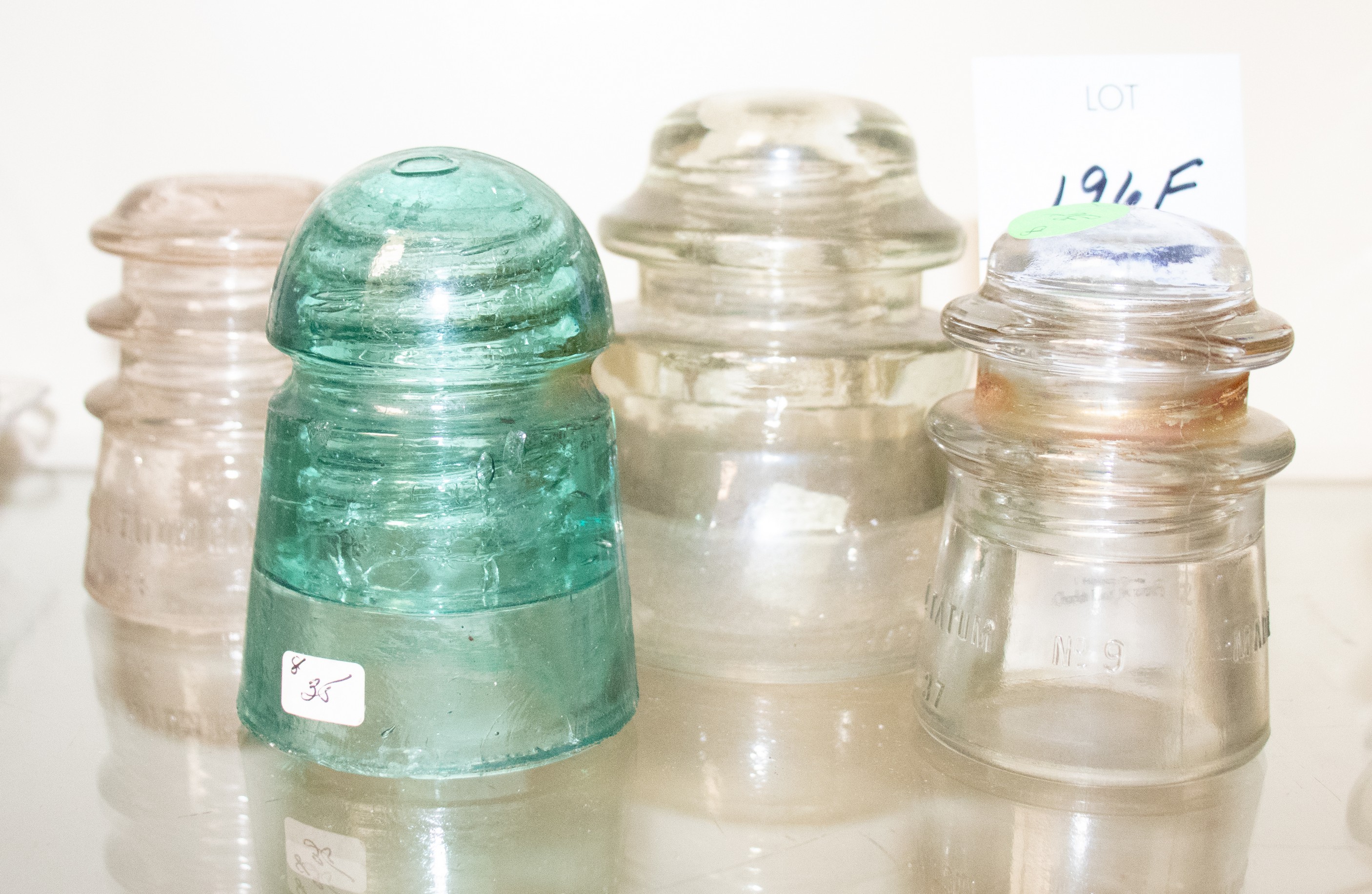 Appraisal: Glass insulators including Whitall Tatum Armstrong's DP tallest