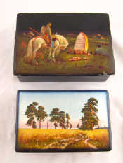 Appraisal: Two Russian lacquer boxes one a rural landscape with pearlescent