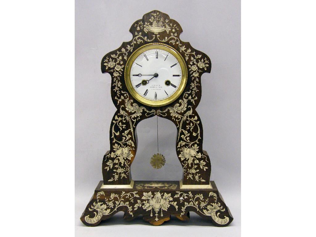 Appraisal: Small Gothic brass mantel timepiece the drumhead movement within a