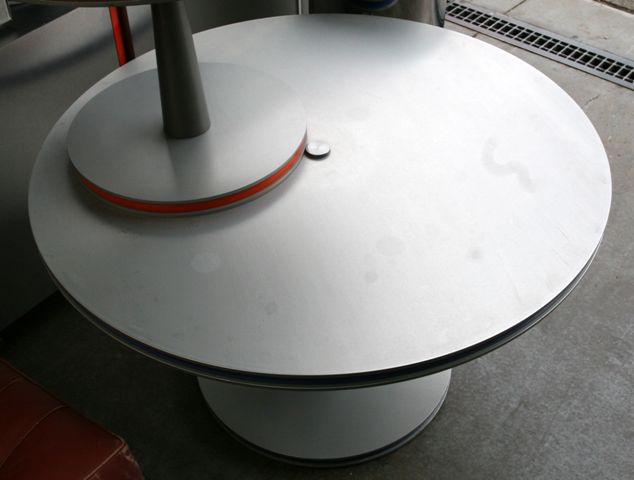 Appraisal: A circular stainless steel occasional table cm diameter cm high