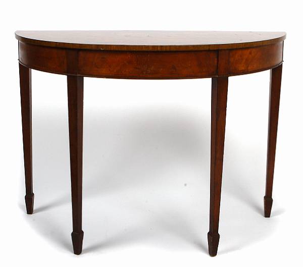 Appraisal: A pair of Regency style mahogany demilune side tables height