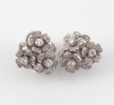 Appraisal: A pair of diamond foliate cluster earrings Each earring formed