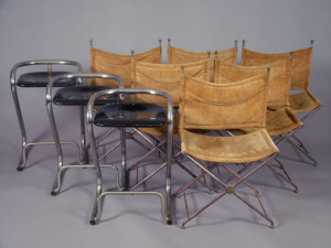 Appraisal: A set of modern chrome stools with ebonised seats and