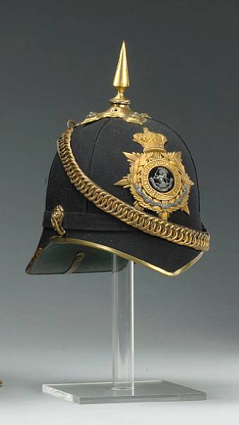 Appraisal: A blue wool officer's home service helmet for the West