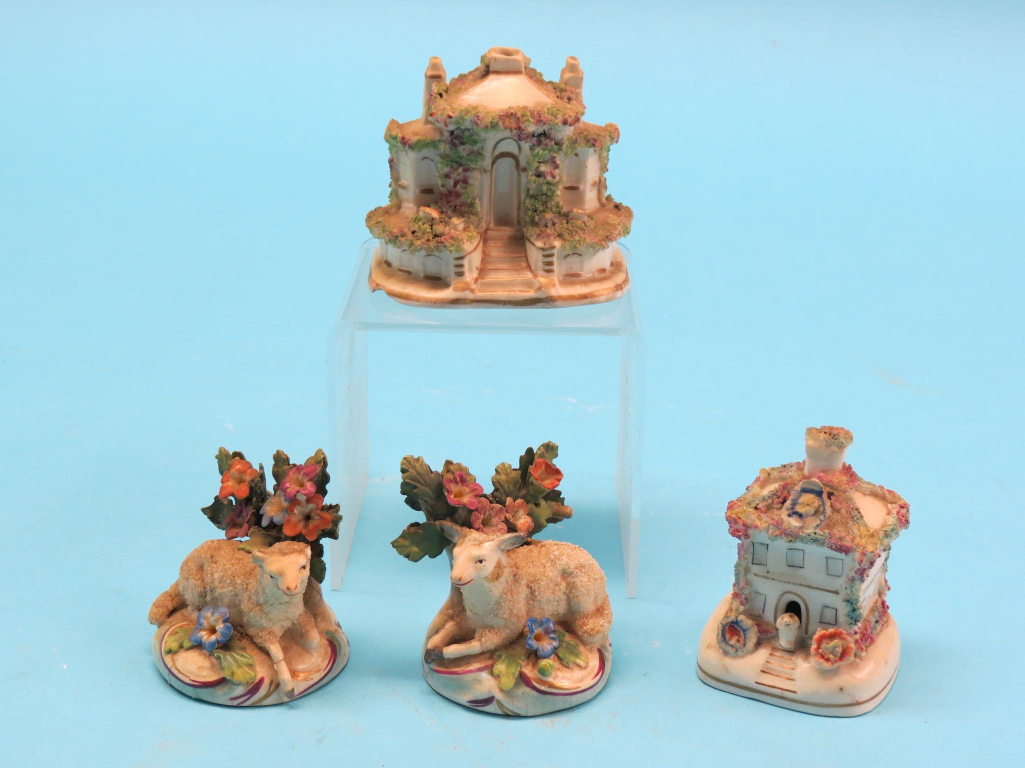 Appraisal: Two th century bone china cottage models in together with