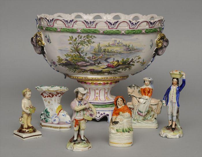 Appraisal: FIVE SMALL STAFFORDSHIRE FIGURES Together with a porcelain cornucopia-form inkwell