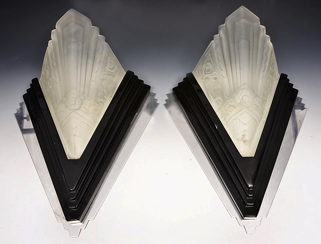 Appraisal: A PAIR OF ART DECO STYLE GLASS WALL LIGHTS of