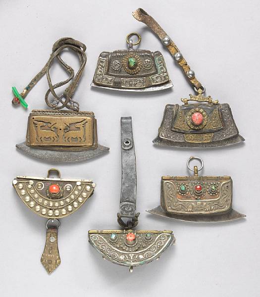 Appraisal: A group of Tibetan metal-mounted leather pouches th th Century