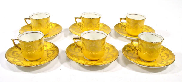 Appraisal: Set of six Royal Doulton coffee cans and saucers printed