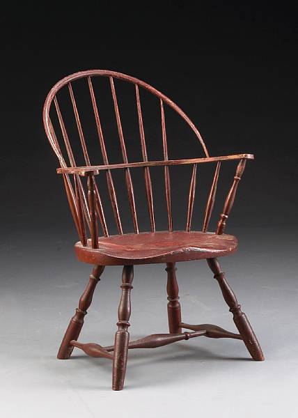 Appraisal: A sack back painted Windsor armchair early th century