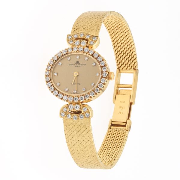 Appraisal: LADIES' BAUME MERCIER GOLD AND DIAMOND WATCH long bracelet mm