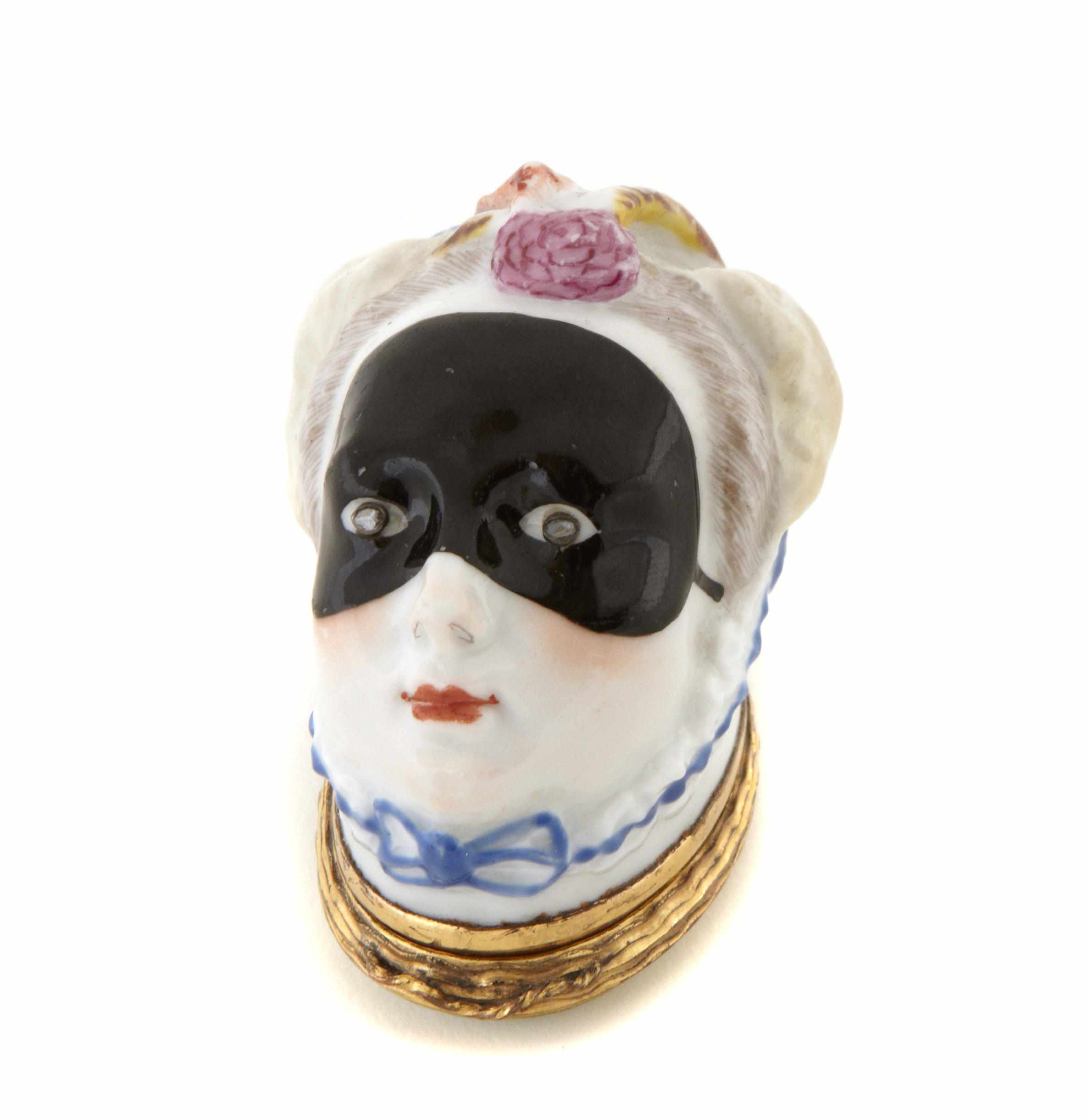 Appraisal: A Continental porcelain and enamel snuff box height in