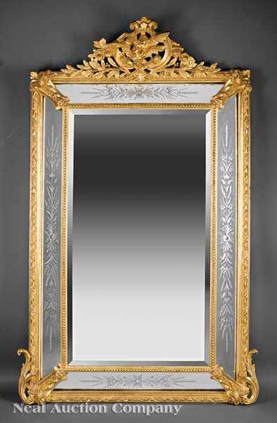 Appraisal: An Antique Louis XVI-Style Carved and Gilt Mirror carved crest