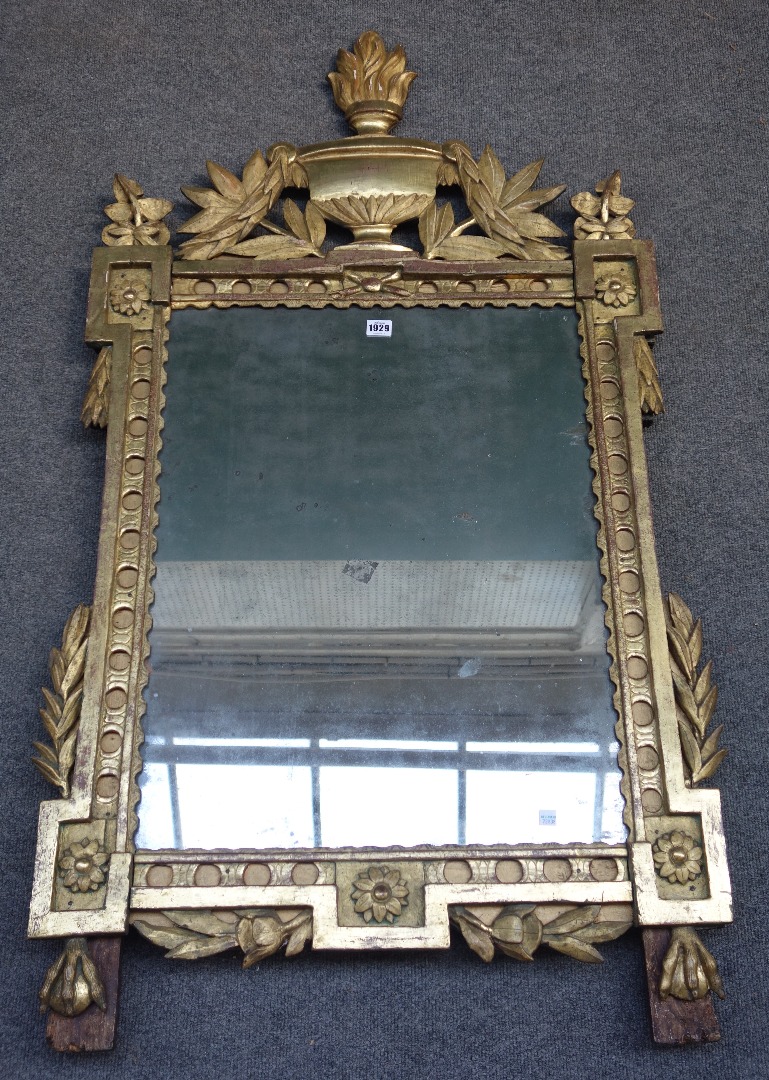 Appraisal: An th century French gilt framed wall mirror with flaming