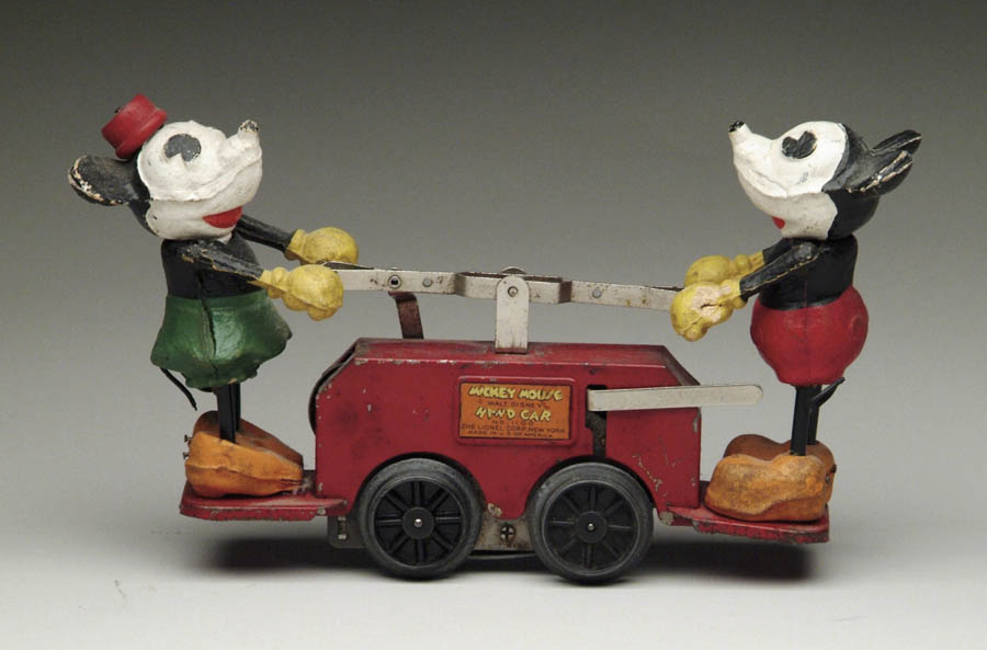 Appraisal: LIONEL MICKEY MOUSE AND MINNIE HANDCAR Large composition Mickey and