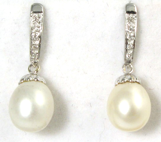 Appraisal: PAIR OF PEARL AND DIAMOND EARRINGS each k white gold