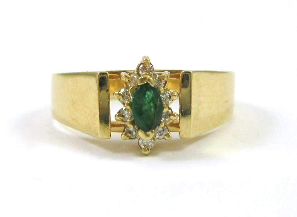 Appraisal: EMERALD DIAMOND AND FOURTEEN KARAT GOLD RING with round-cut diamonds