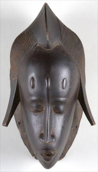 Appraisal: Carved Wooden African Mask th century depicts a young woman