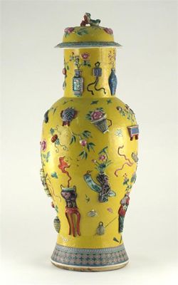 Appraisal: A large Chinese baluster vase and cover moulded in relief