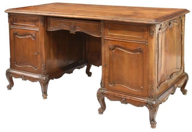 Appraisal: French Louis XV style fruitwood desk th c rectangular top