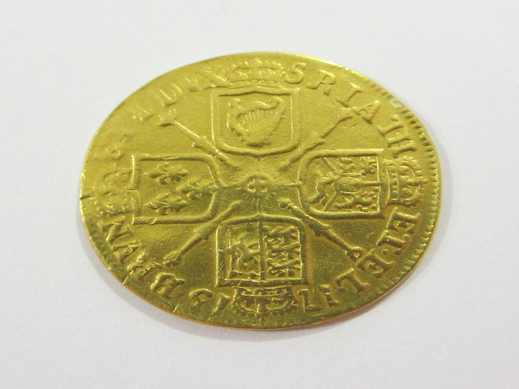 Appraisal: A George I gold guinea dated laureate head and cross