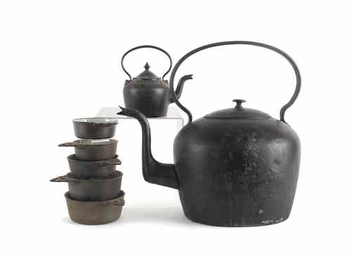 Appraisal: Massive tin tea kettle th c h together with Kenrick