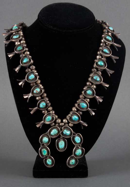 Appraisal: Sterling silver and turquoise squash blossom Navajo necklace approximately in