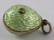 Appraisal: A Russian silver and enamel egg pendant suspension ring marked