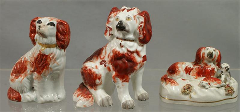 Appraisal: Staffordshire rust spaniels figures craquelure tallest Estimate -