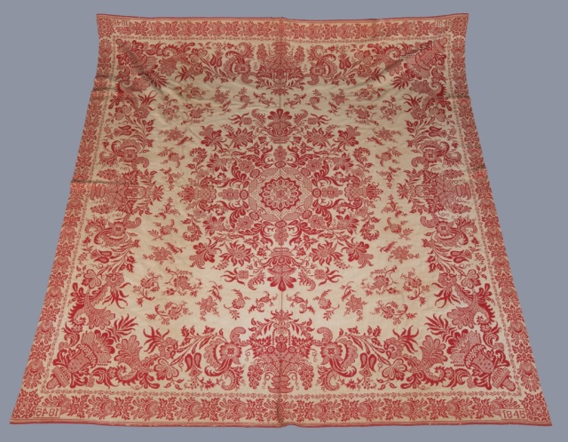 Appraisal: a Ohio Jacquard Coverlet Red and beige floral motif with