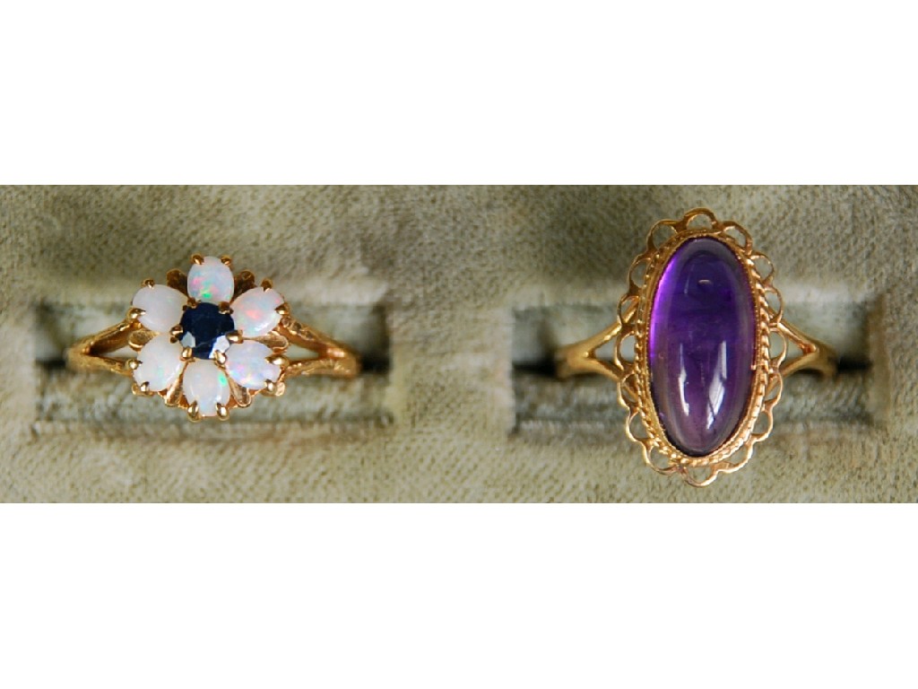 Appraisal: ct GOLD OPAL AND SAPPHIRE CLUSTER EARRINGS having a centre