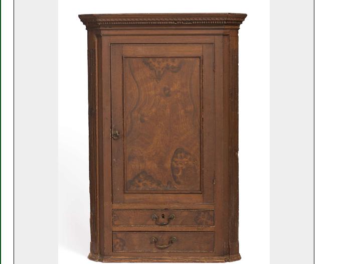 Appraisal: EARLY GRAIN PAINTED HANGING CORNER CUPBOARD PROBABLY ENGLISH The dentil-carved