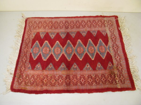 Appraisal: Diamond pattern small tightly woven wool area rug with fringe