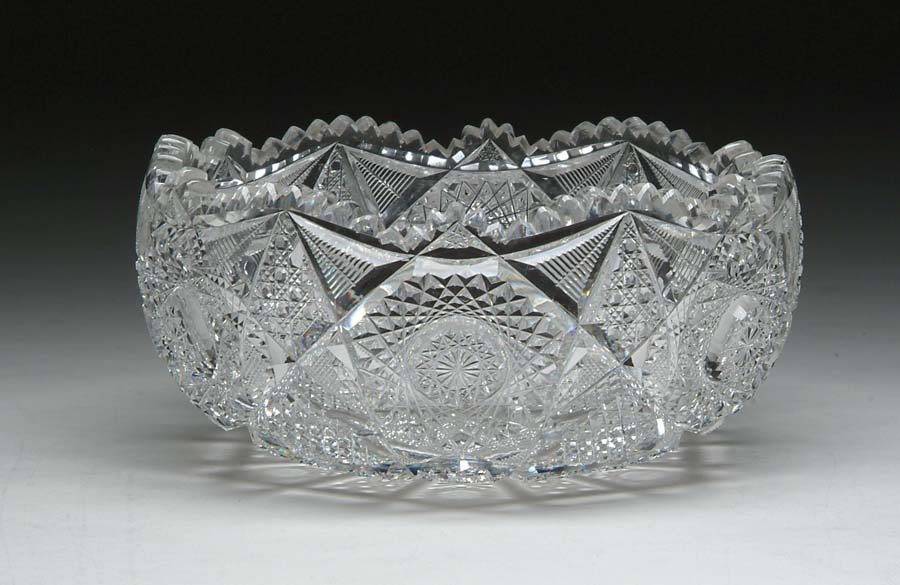 Appraisal: CUT GLASS BOWL Bowl is cut in hobstar and cane