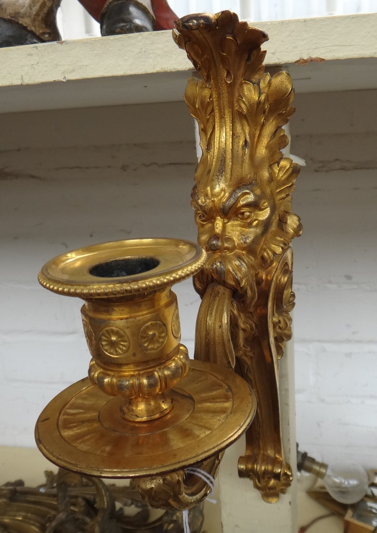 Appraisal: A pair of Italian gilt bronze single wall sconces th