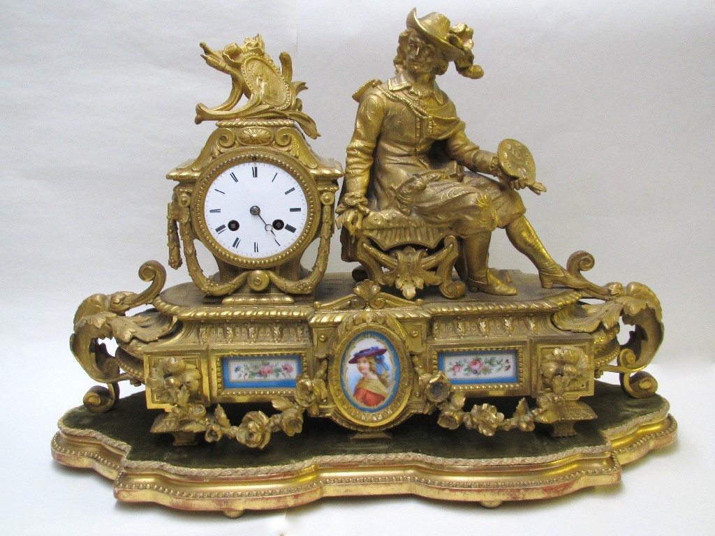 Appraisal: A French gilt metal mantel clock cast with a male