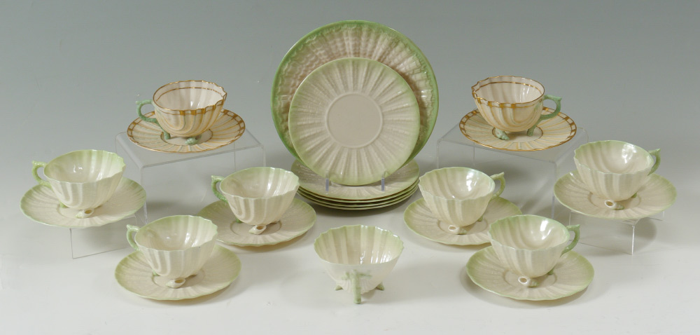 Appraisal: BELLEEK BLACK MARK NEPTUNE CUPS AND SAUCERS piece green tinted