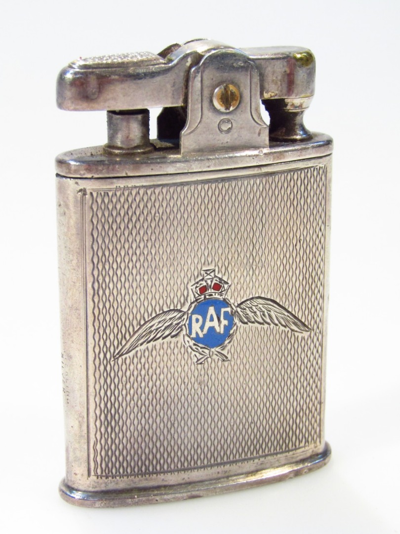 Appraisal: An early thC Ronson pocket lighter centred by RAF wings