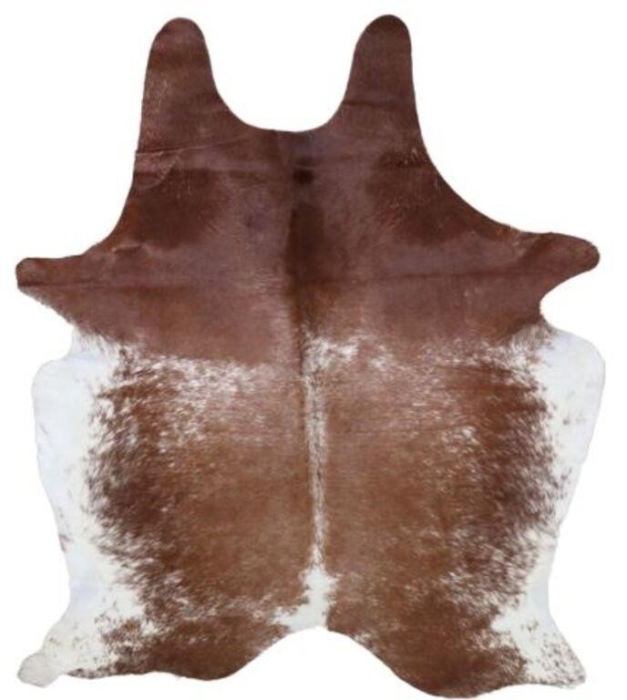 Appraisal: Cowhide brown and white approx l w