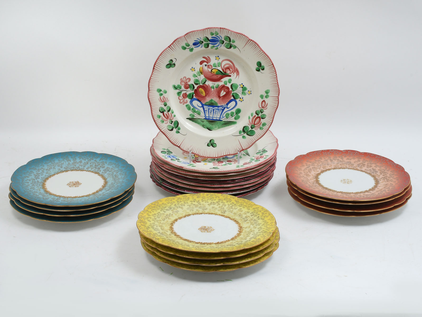 Appraisal: PC LIMOGES PLATES AND PC FRENCH MAJOLICA PLATES Comprising -