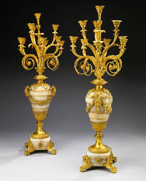 Appraisal: A pair of Louis XVI style gilt bronze mounted onyx