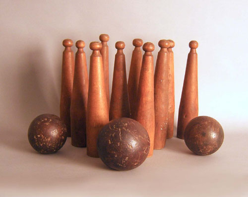 Appraisal: Three early bowling balls together with pins