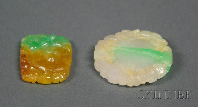 Appraisal: Two Jade Pendants one yellow and green carved as a