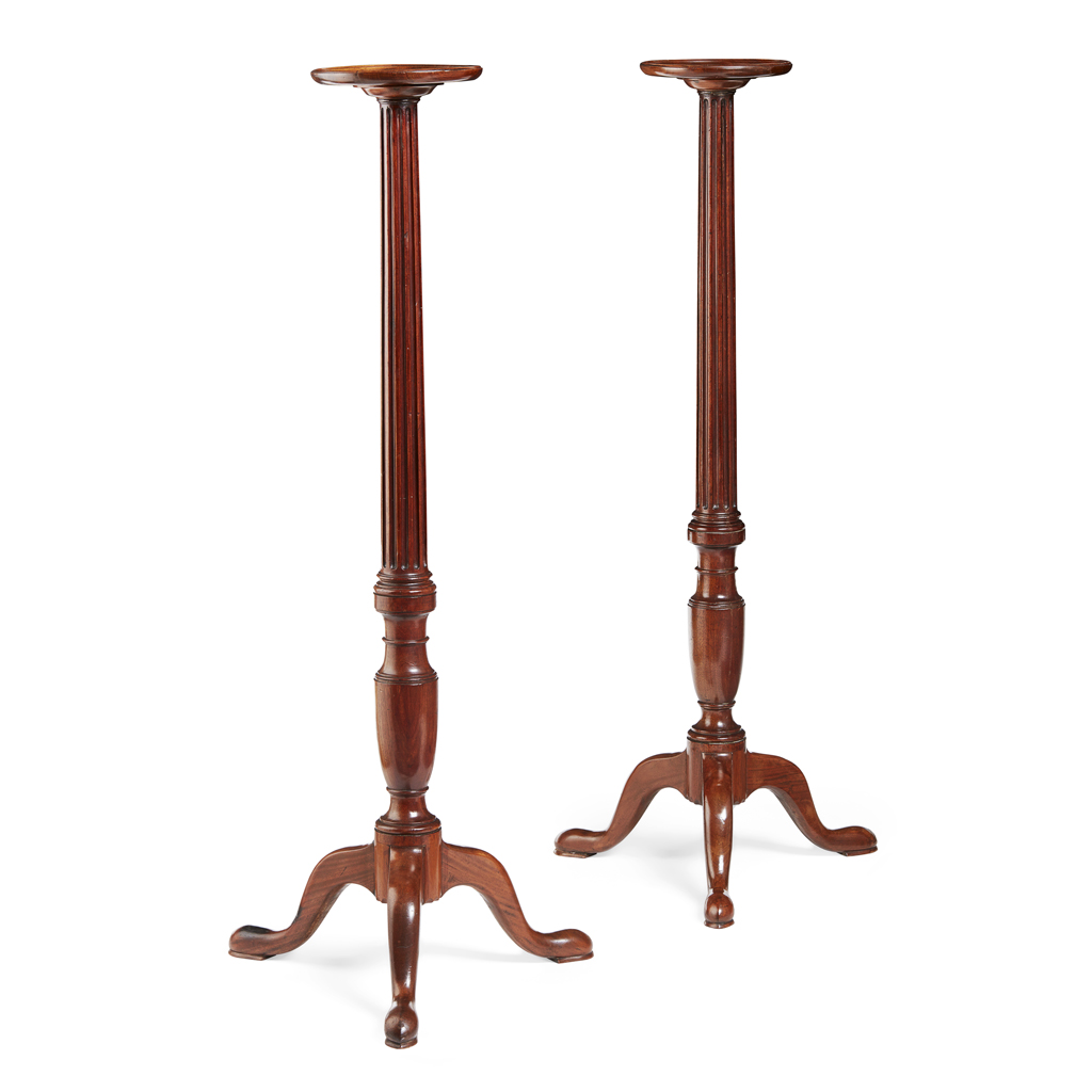 Appraisal: PAIR OF GEORGIAN CARVED MAHOGANY TORCHERES EARLY TH CENTURY the