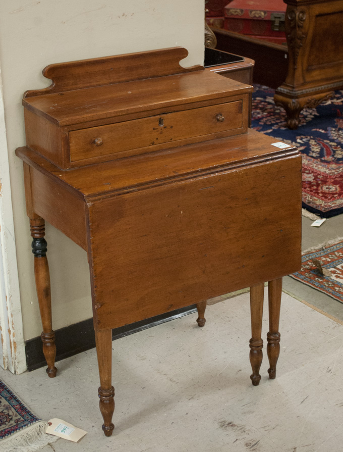 Appraisal: COUNTRY PINE DROP-LEAF WRITING DESK American th century having a