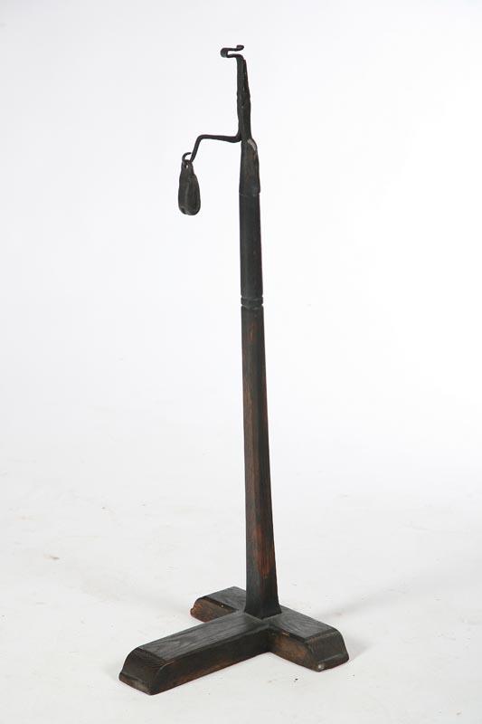 Appraisal: FLOOR RUSHLIGHT Probably American th century wrought iron Rushlight holder