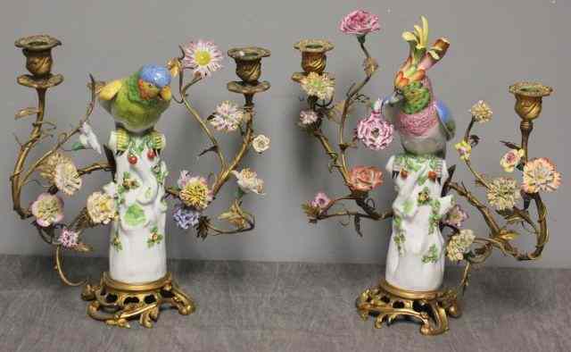 Appraisal: A Large Pair of Porcelain Cockatoo Candelabras With gilded bronze