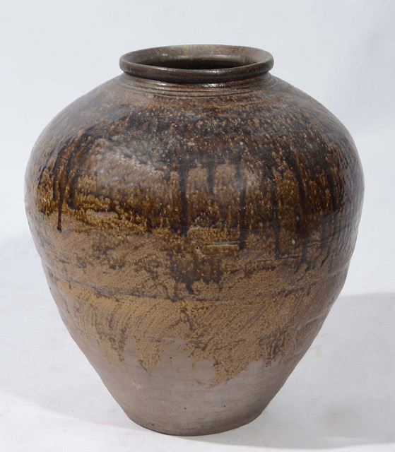 Appraisal: A LARGE BURMESE GLAZED OVOID FORM STORAGE JAR cm high