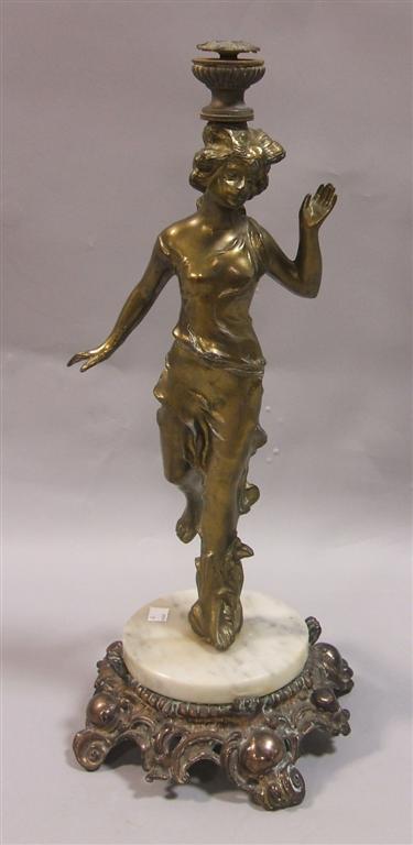 Appraisal: CLASSICAL GILT-METAL FIGURE OF A WOMAN The classical figure in